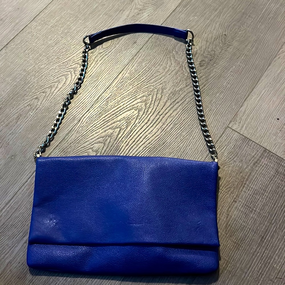 Medium size blue shoulder bag. From express. silver metals on zipper and strap